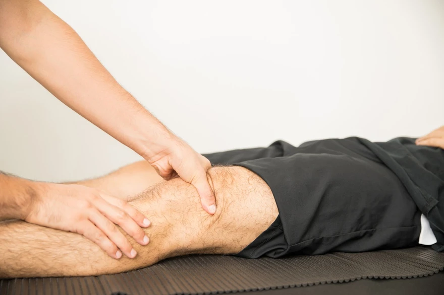 Medical illustration showing cartilage damage and loose fragment in Osteochondritis Dissecans inside a joint